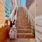 Bespoke-Synergy-Straight-Stairlift-Near-Staircase
