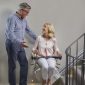 Couple-Happly-Talking-While-Using-Bespoke-Synergy-Straight-Stairlift