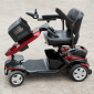 Folded-Red-2-in-1-Electric-Wheelchair-and-Mobility-Scooter.png