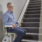 Man-Sitting-on-Bespoke-Synergy-Straight-Stairlift