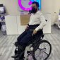 Person-Sitting-on-Lightweight-Manual-Sport-Standing-Wheelchair-Semi-Standing-Position.jpg