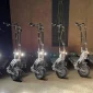 Vostok-WTF-Electric-Scooter-Front-View-With-Lights-On.webp