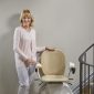 Woman-Standing-NEar-Bespoke-Synergy-Straight-Stairlift