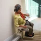 old-woman-using-pinnaacle-stairlifts-harmer
