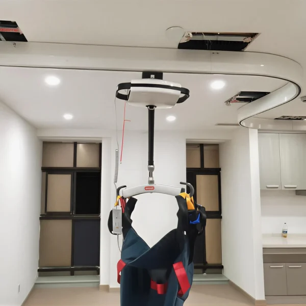 Advanced-Ceiling-Hoist-System-in-Room.webp Advanced-Ceiling-Hoist-System-in-Room.webp