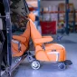 Lifting-and-Rotating-Turny-Seat-Changed-To-Wheelchair-on-Floor.webp