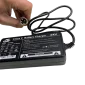 Person-Holding-Air-Hawk-Electric-Wheelchair-Charger.webp