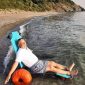 Person-Sitting-on-Star-Beach-Water-Wheelchair.jpeg