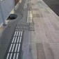 Stainless-Steel-Hollow-Tactile-Indicator-Slip-Installed-on-Floor.webp