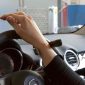 hand-with-steering-wheel-fork-handgrip.jpeg