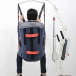 Person Sitting on Portable Patient Hoist Lifter