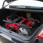 Red Air Hawk Wheelchair Inside Car Trunk