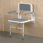 Person Sitting on Wall Mounted and Foldable Shower Chair Rightside View