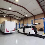 Kia Third Row Wheelchair Accessible Car Conversion Inside Warehouse