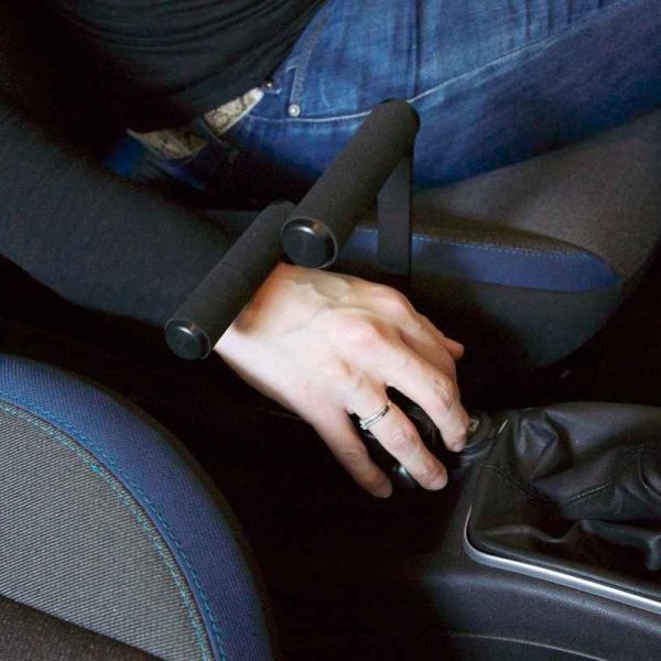 Hand Using Brake Lever Release Handle Installed on Vehicle Hand Using Brake Lever Release Handle Installed on Vehicle