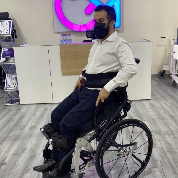 Person Sitting on Lightweight Manual Sport Standing Wheelchair Semi Standing Position Person Sitting on Lightweight Manual Sport Standing Wheelchair Semi Standing Position