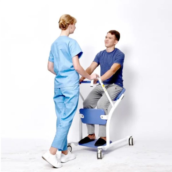 Young Man Using Steady Sit to Stand Manual Lift Young Man Using Steady Sit to Stand Manual Lift
