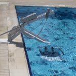 Fixed Pool Transfer Lift Device Seat Completely Inside Swimming Pool Rightside View