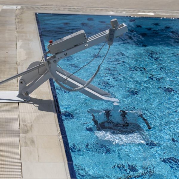 Fixed Pool Transfer Lift Device Seat Completely Inside Swimming Pool Rightside View Fixed Pool Transfer Lift Device Seat Completely Inside Swimming Pool Rightside View