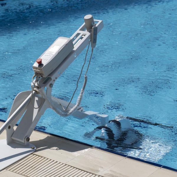 Fixed Pool Transfer Lift Device Seat Completely Inside Swimming Pool Near View Fixed Pool Transfer Lift Device Seat Completely Inside Swimming Pool Near View