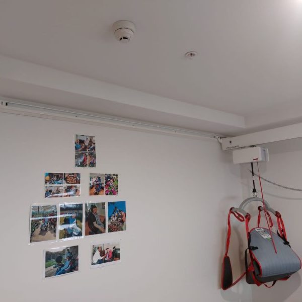 Ceiling Hoist for Patient Transfer Hanging on Ceiling Far View Ceiling Hoist for Patient Transfer Hanging on Ceiling Far View