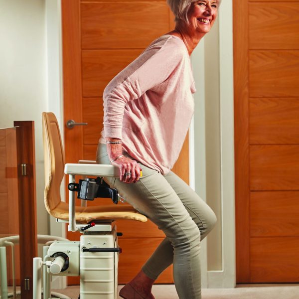 Old Woman Standing From Infinity Stair Lift a Curved Stair Lift Old Woman Standing From Infinity Stair Lift a Curved Stair Lift