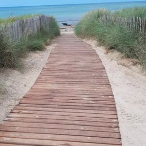 Access Wood a Wooden decking for a natural path on beach