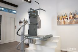 Opened SLIM Inclined Platform Lift for Stairs with Curves Near Staircase