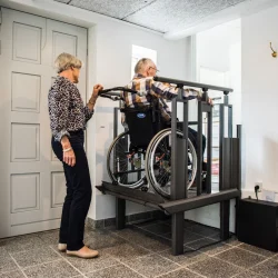 Old Man Using FlexStep Compact Stairlift