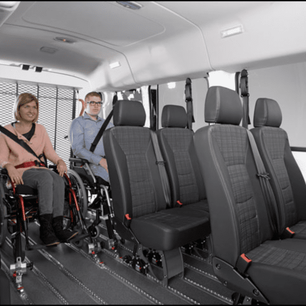 Person on Wheelchair Sitting Inside Vehicle Person on Wheelchair Sitting Inside Vehicle
