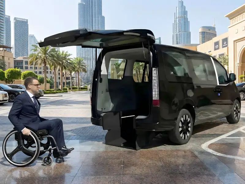 Person Going Towards Ultimate G24 Wheelchair Accessible Van