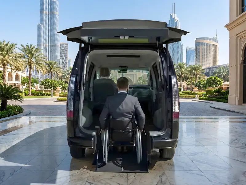 Tourist Getting Into Ultimate G24 Wheelchair Accesible Van