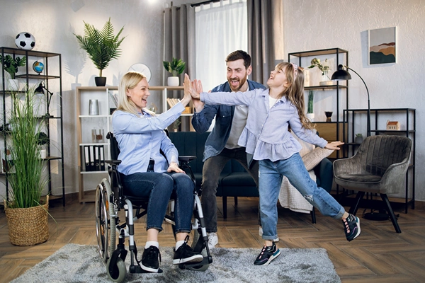 Mother on Wheelchair Happy with Family